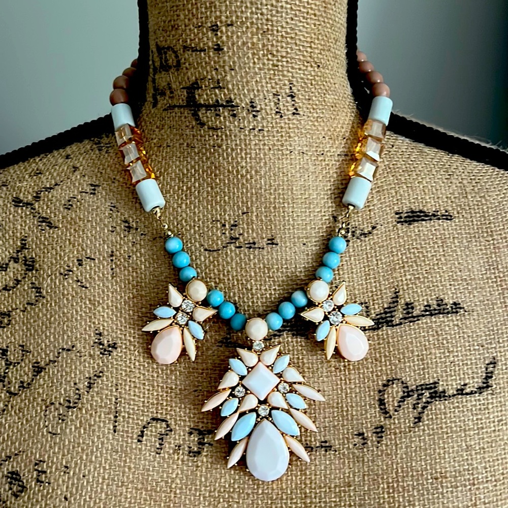 NWT NY & co statement necklace. Teal, pink beads with gold hardware.